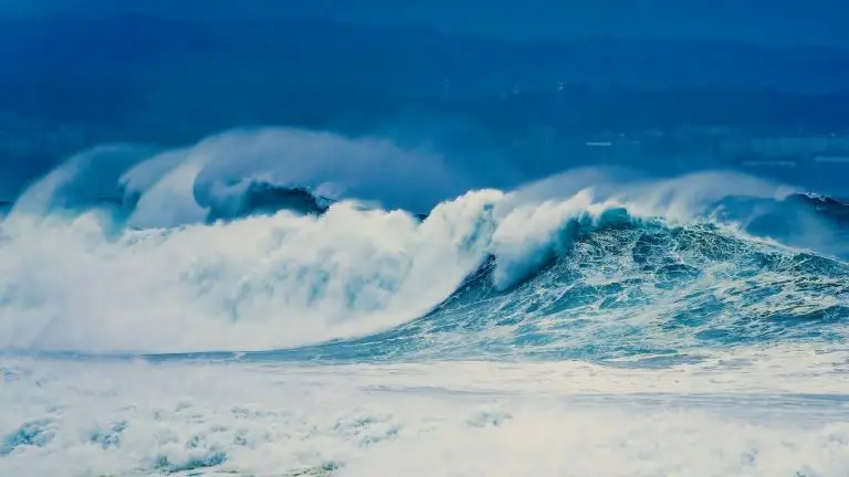 Powerful ocean waves breaking on the shore.