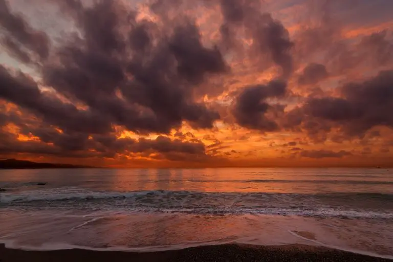 practicing the guide to breathwork by the ocean shore