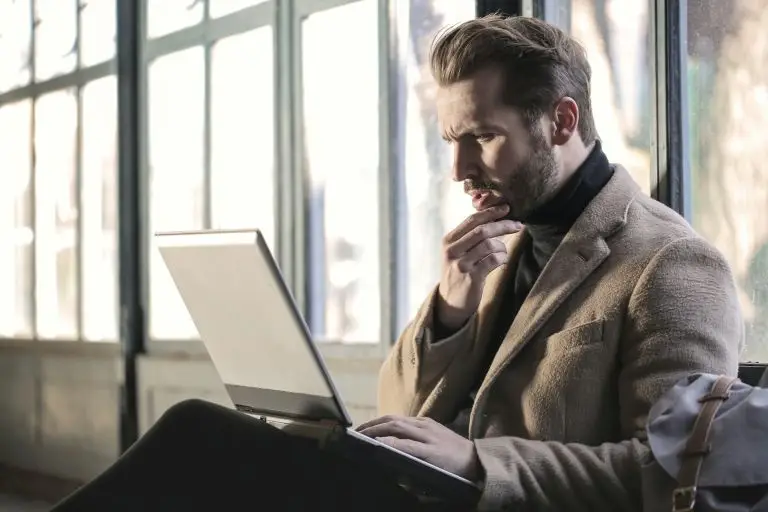 man on computer, improve focus with breathwork