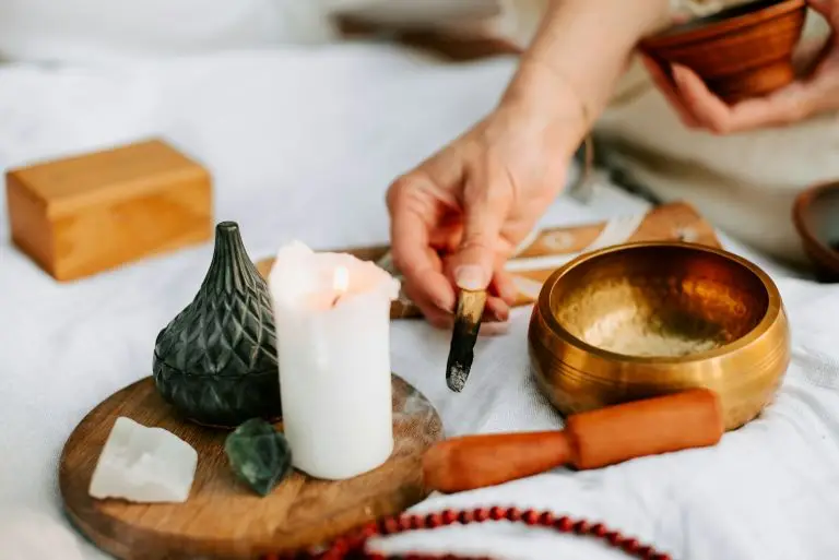 lighting a candle for mantra meditation